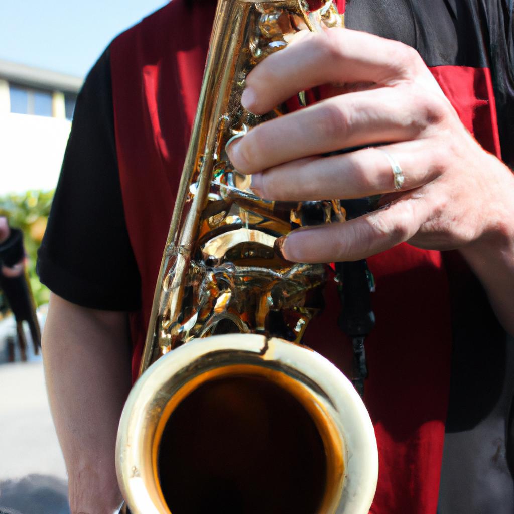 Person playing a saxophone instrument