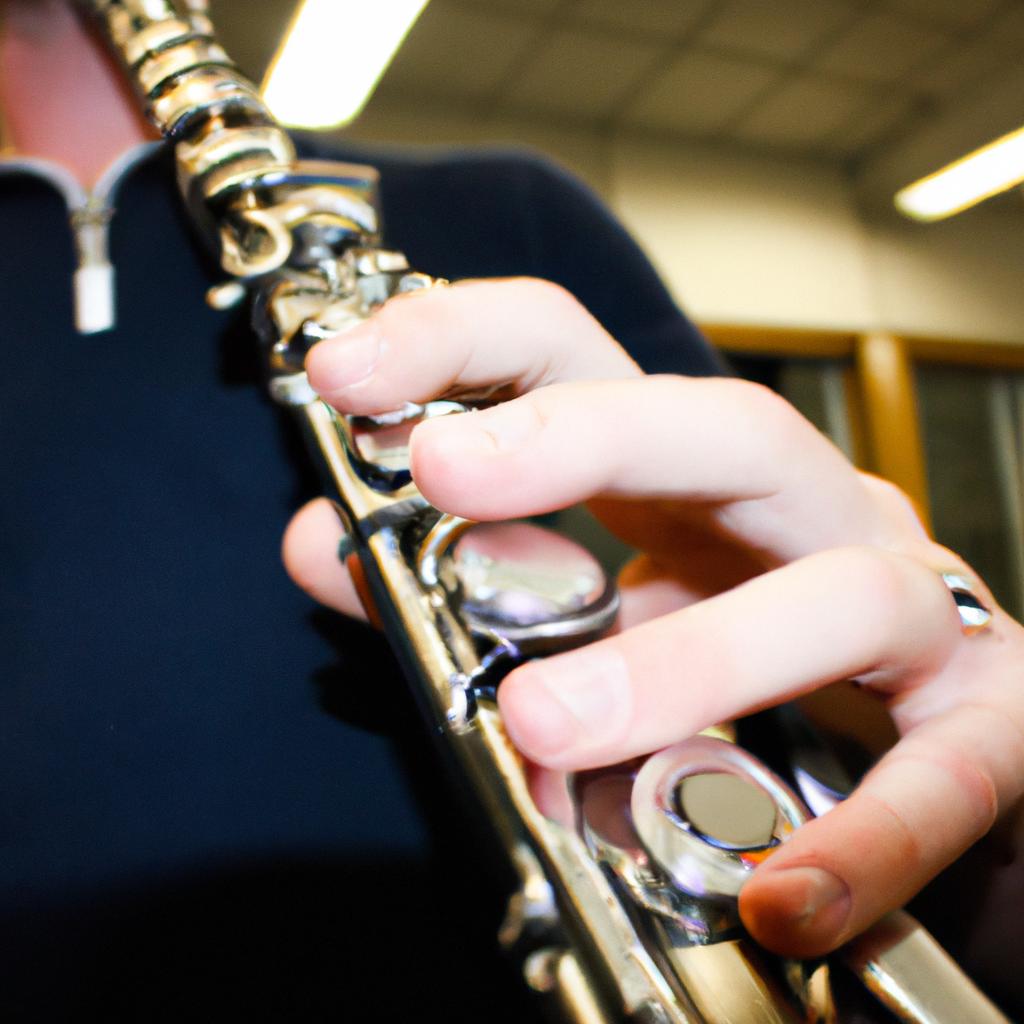 Person playing a woodwind instrument